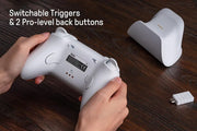 وحدة تحكم الألعاب اللاسلكية 8Bitdo Ultimate 2 مزودة بعصا تحكم TMR - ومحفزات قابلة للتبديل بين تأثير هول واللمس - وتحكم بالحركة - وتقنية لاسلكية بثمانية سرعات، وقاعدة شحن - وحلقة إضاءة RGB لأجهزة الكمبيوتر الشخصية وأجهزة أندرويد