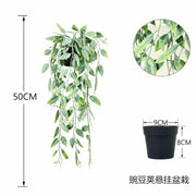 Artificial potted plants in black pots - 4 different shapes